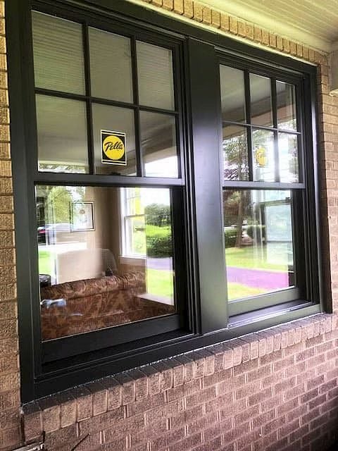 Black replacement windows on a home